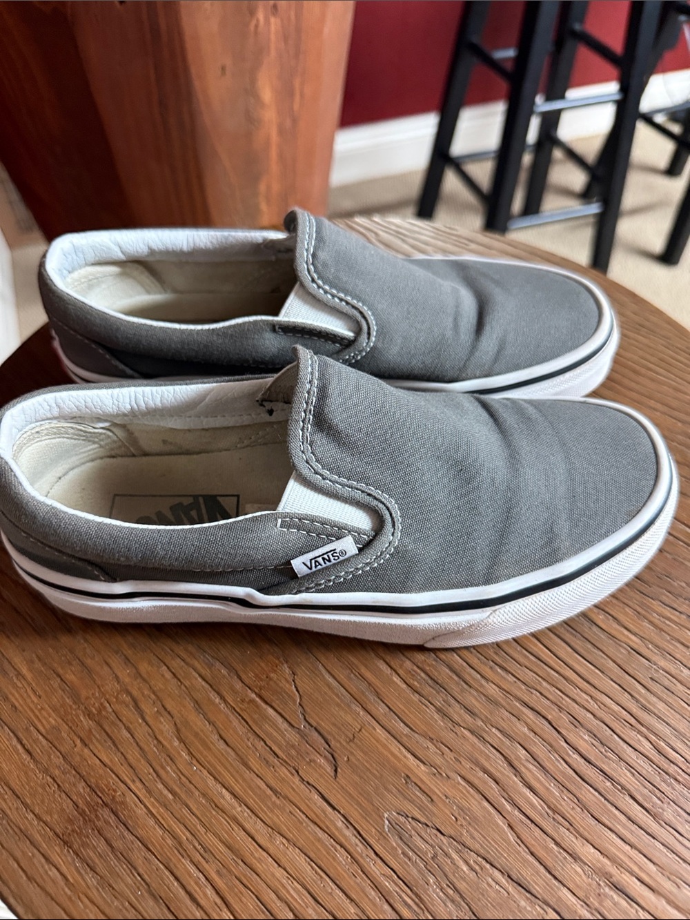 Vans Women’s Slip-On Canvas Sneakers in Gray and White